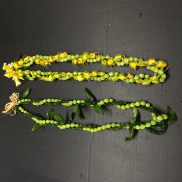 Sea grape lei twisted with other leis